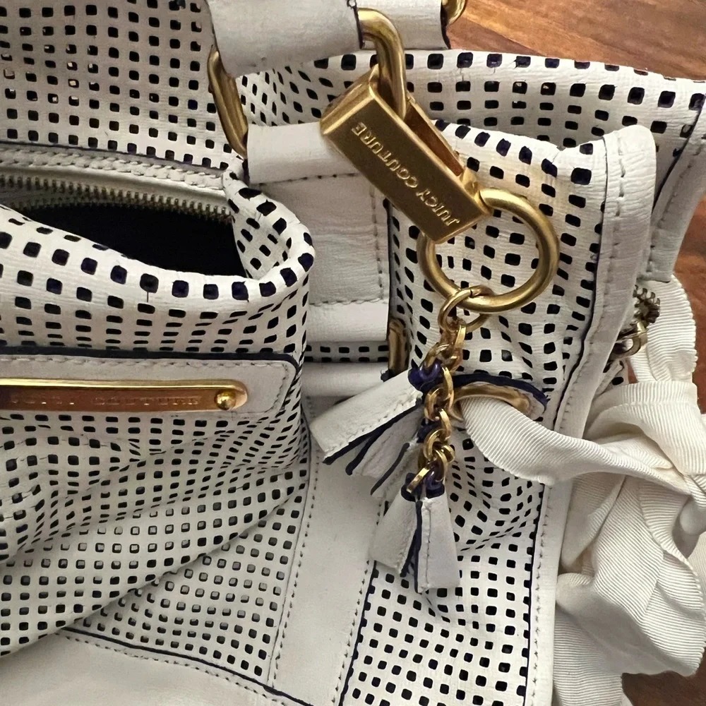 Juicy Couture White and Black Perforated Satchel